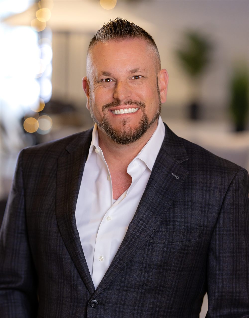 Daman Wood, President and Chief Operating Officer of OPTRIC
